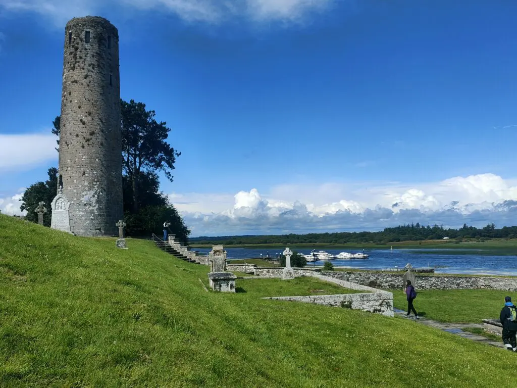 Scenic Irish monastic ruin beside the River Shannon surrounding by lush green pastures