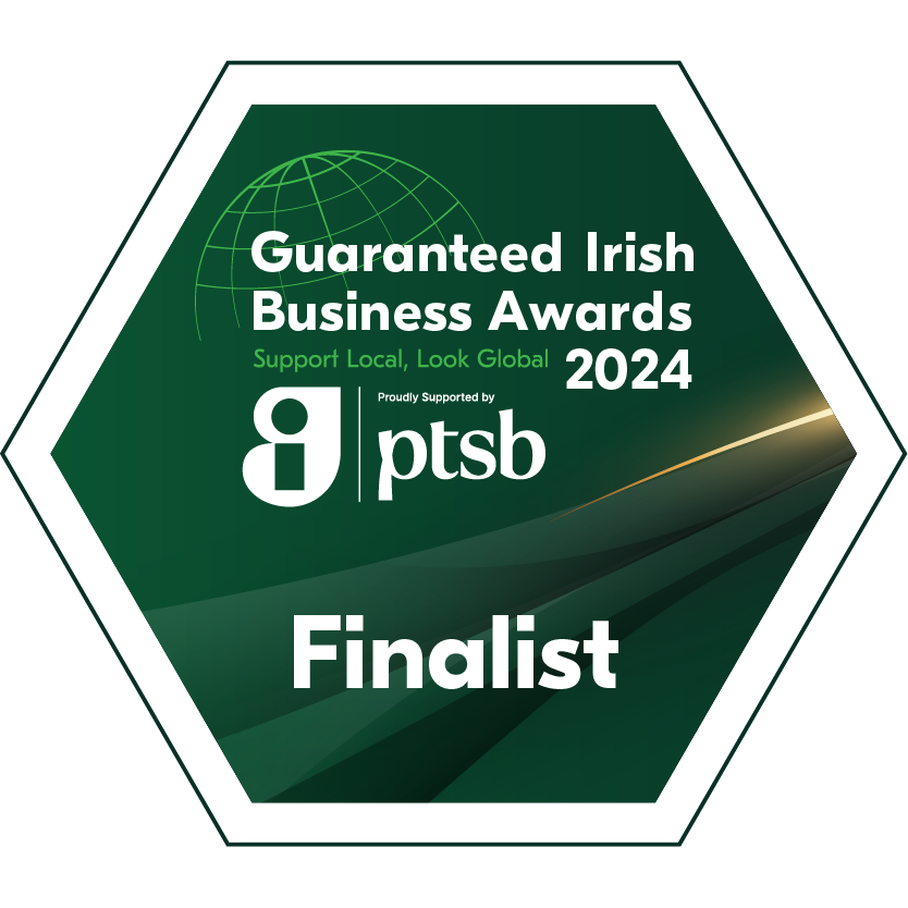 Hexagonal badge reading "Guaranteed Irish Business Awards 2024, Support Local, Look Global, Finalist," with an icon and sponsorship from ptsb. Celebrate excellence with Custom Ireland Tours offering escorted & private tours of Ireland for a truly unique experience.